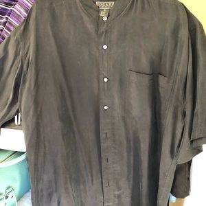 Black silk collarless shirt.